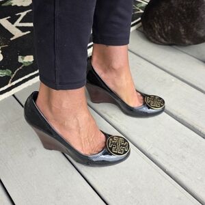 Tory Burch Black Patent Wedge Pumps with Gold Logo Medallion